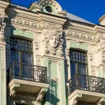 Ornate Latvian Art Nouveau facade with sculpted mascarons