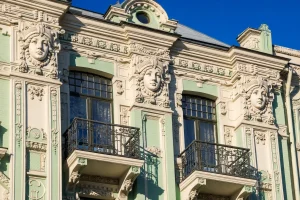 Ornate Latvian Art Nouveau facade with sculpted mascarons