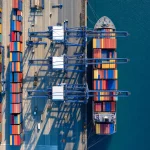 Aerial view of a container terminal with a ship at berth
